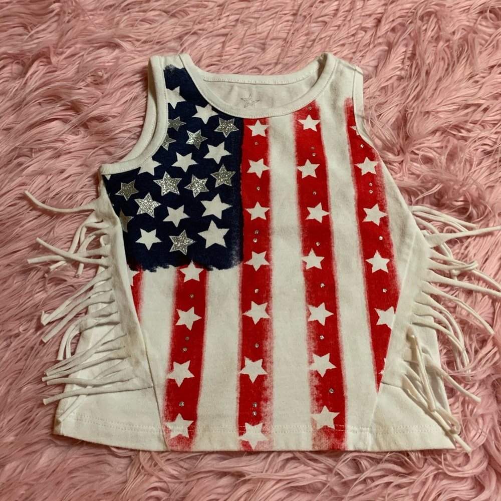 Tank top with fringe.